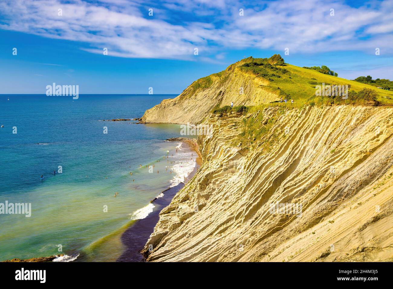 View of one of the top of the Zumaya cliff with the limestone rocks forming layers. Euskadi, Spain Stock Photo