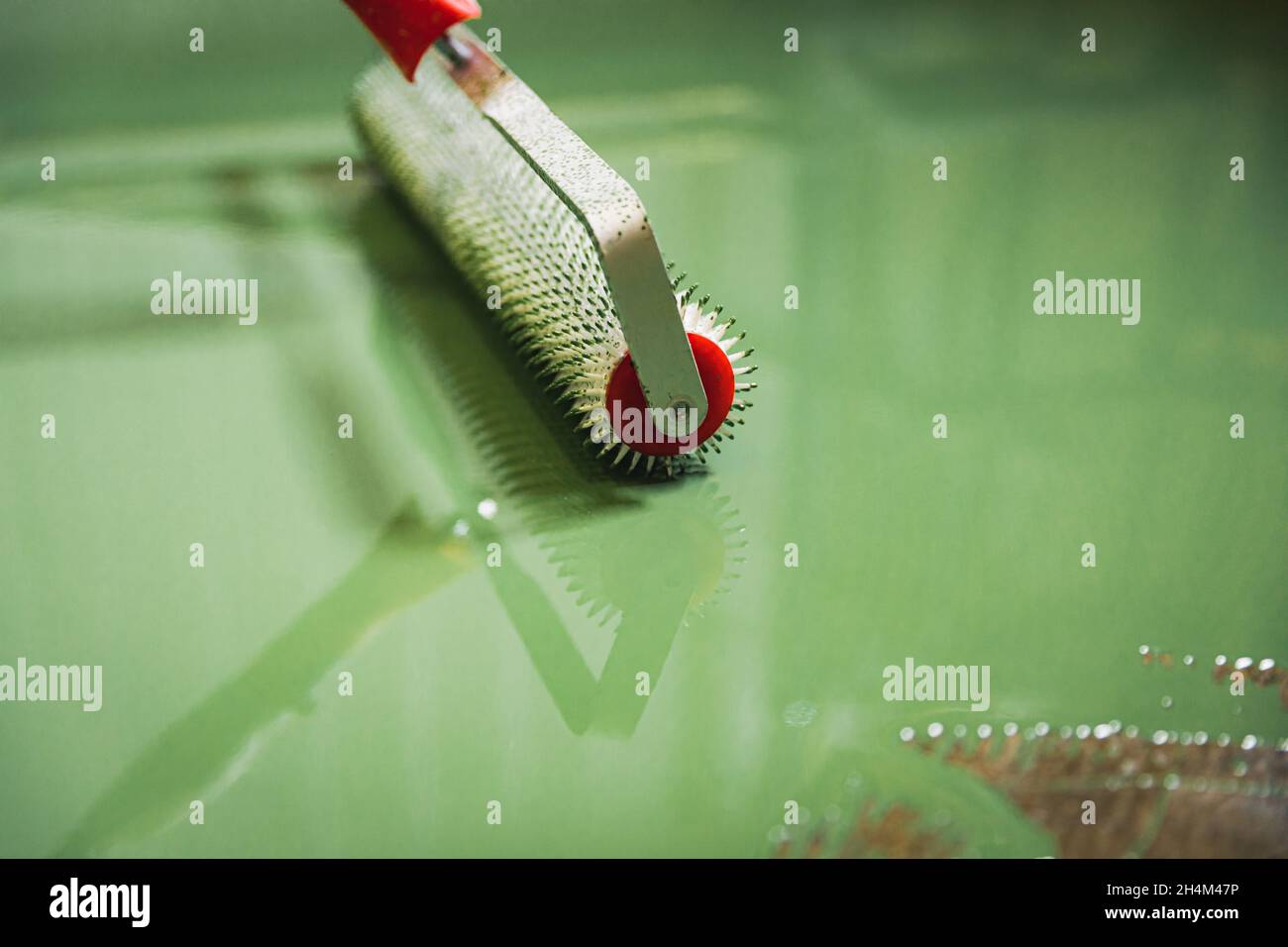 Epoxy flooring tools, preparation, and application of epoxy resin green Stock Photo Alamy