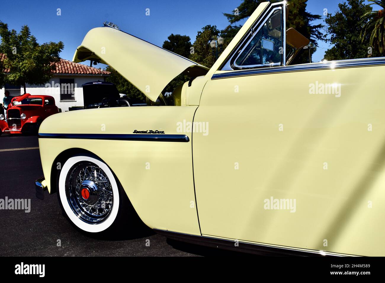FRESNO, UNITED STATES - Oct 09, 2021: A Closeup of Classic 1949 Origin Special Yellow-colored Deluxe Plymouth Convertible Pale Stock Photo