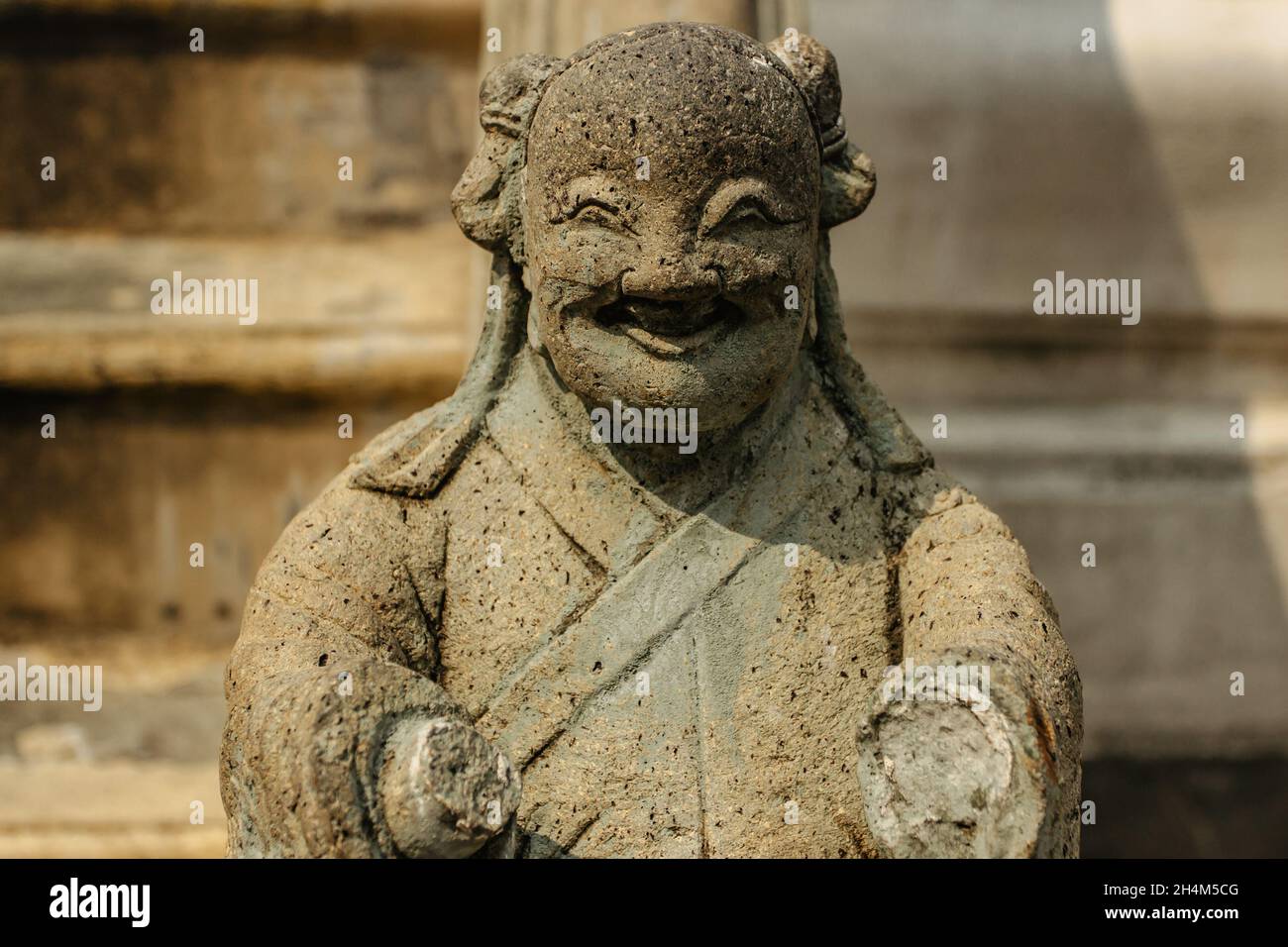 Bangkok, Thailand-January 16,2020.Chinese guardian figure, Warrior Sculpture in Wat Pho Buddhist temple complex.Detail of old stone statue.Popular Stock Photo