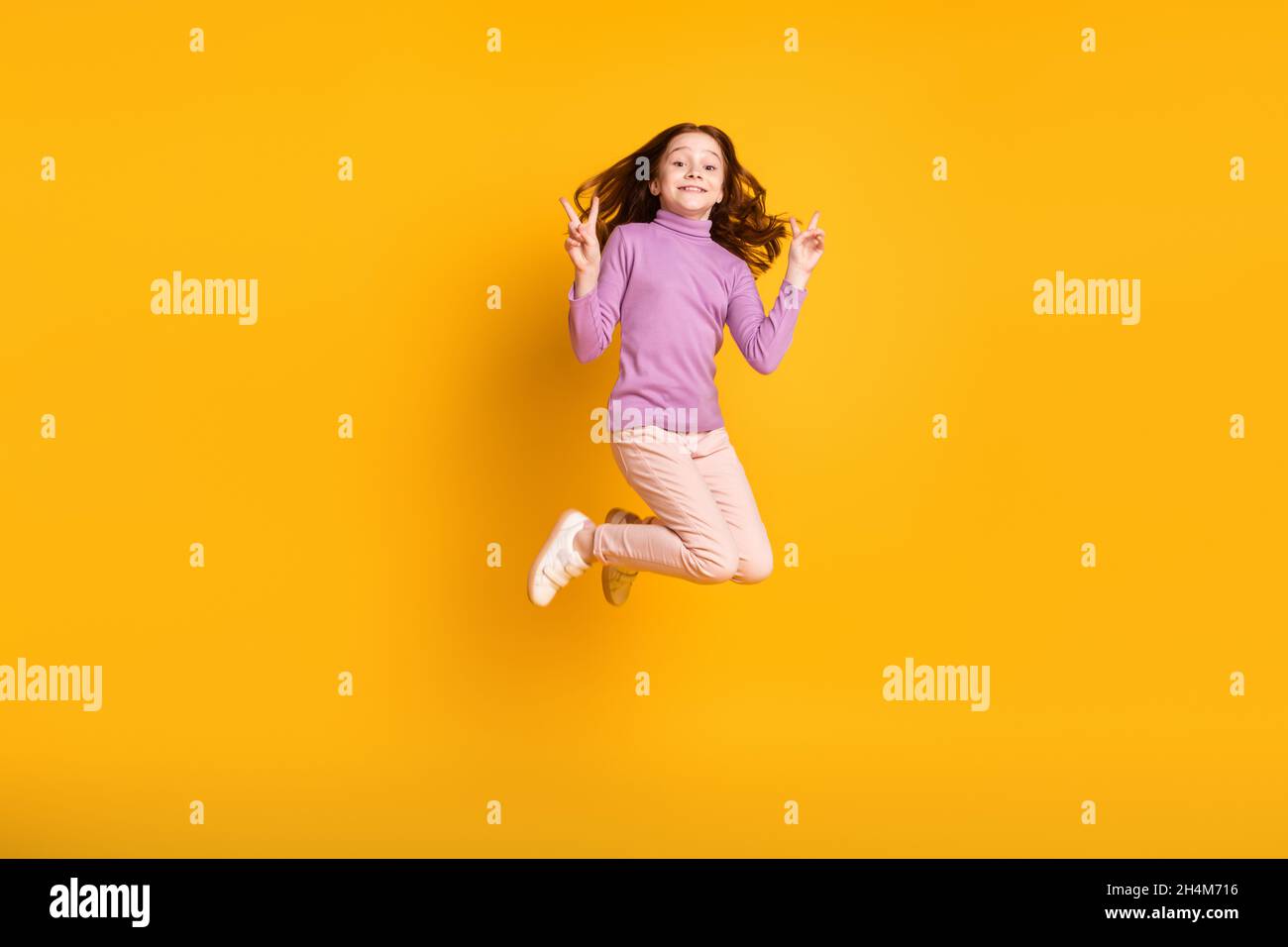 Full size photo of happy excited smiling cheerful little girl jumping ...