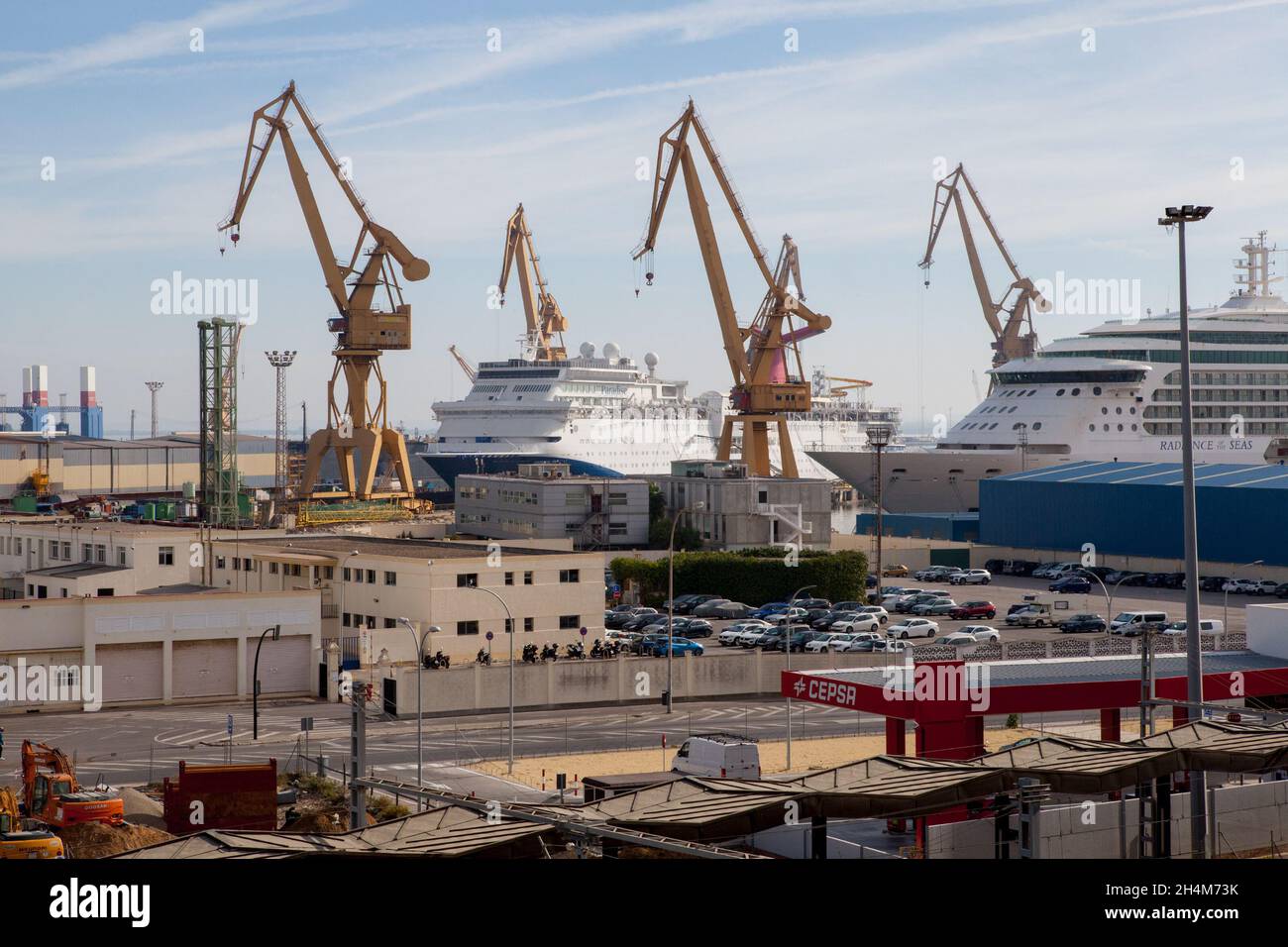 Cruise liners and cranes in Cadiz port Stock Photo