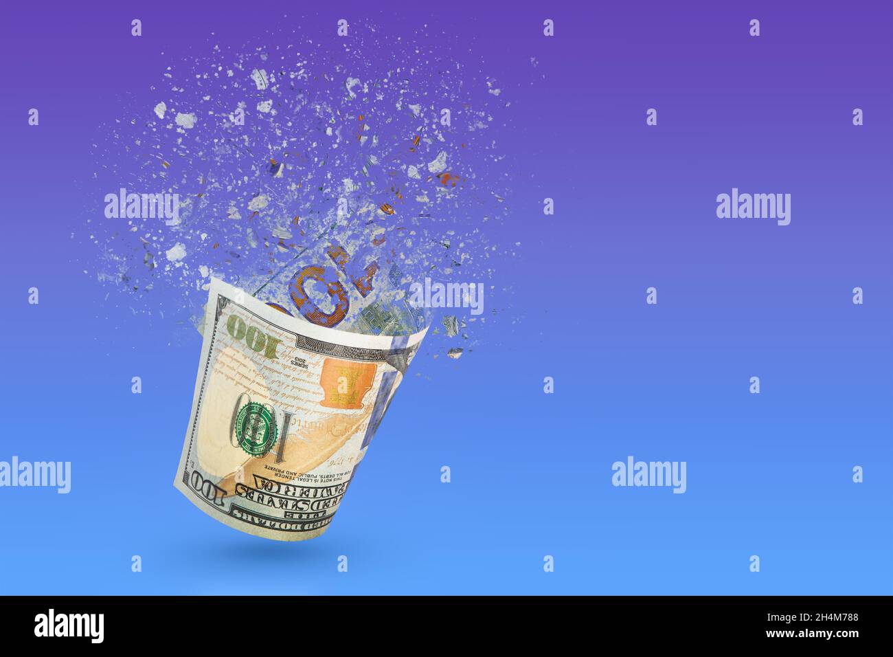 Inflation, hyperinflation, dollar stagflation. One hundred dollar bill sprayed on a blue background. The bill casts a shadow. The concept of declining Stock Photo