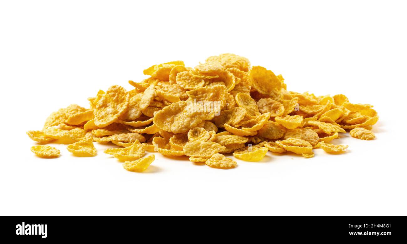 Corn flake cereal in a pile isolated against a white background Stock Photo