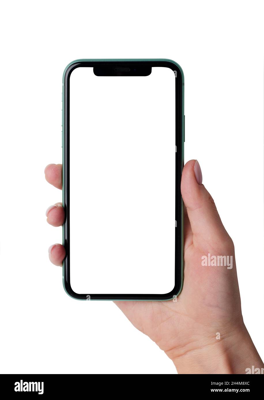 Moscow, Russia - June 18, 2020: Green Apple iPhone 11 mock up in a female hand isolated on a white background. Close-up of a new smartphone from Apple Stock Photo
