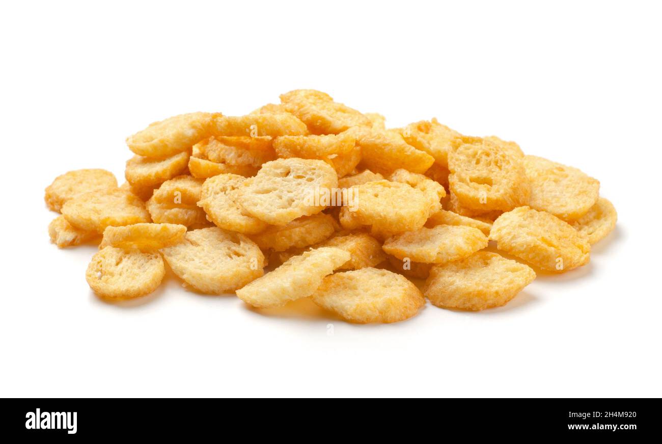 Heap crunchy wheat spicy sticks croutons isolated on white background. Fast food template for menu, advertising, cover. Stock Photo