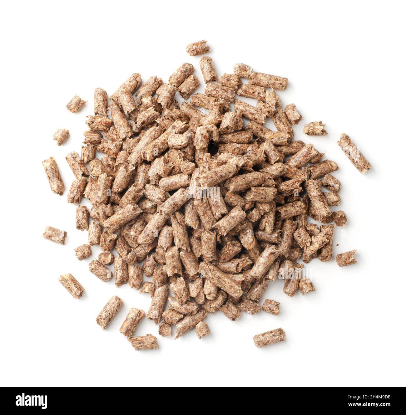 Close up on a pile of compressed wood pellets for use as an eco-friendly renewable organic biofuel or mulch in the garden over a white background. Top Stock Photo