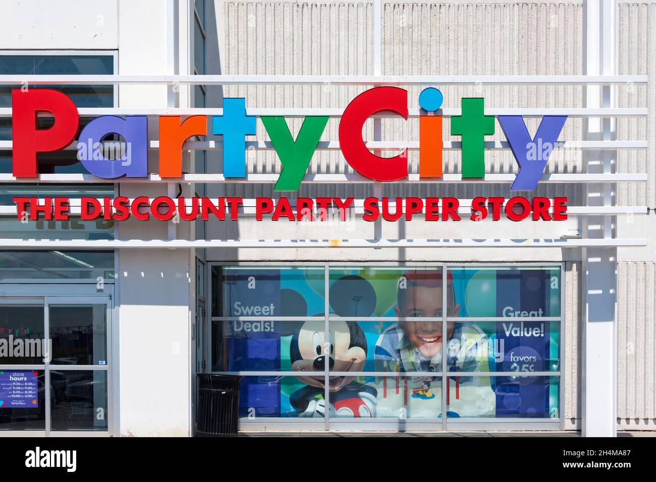 Entrance sign to a Party City retail store in Toronto Canada. Nov. 2, 2021 Stock Photo
