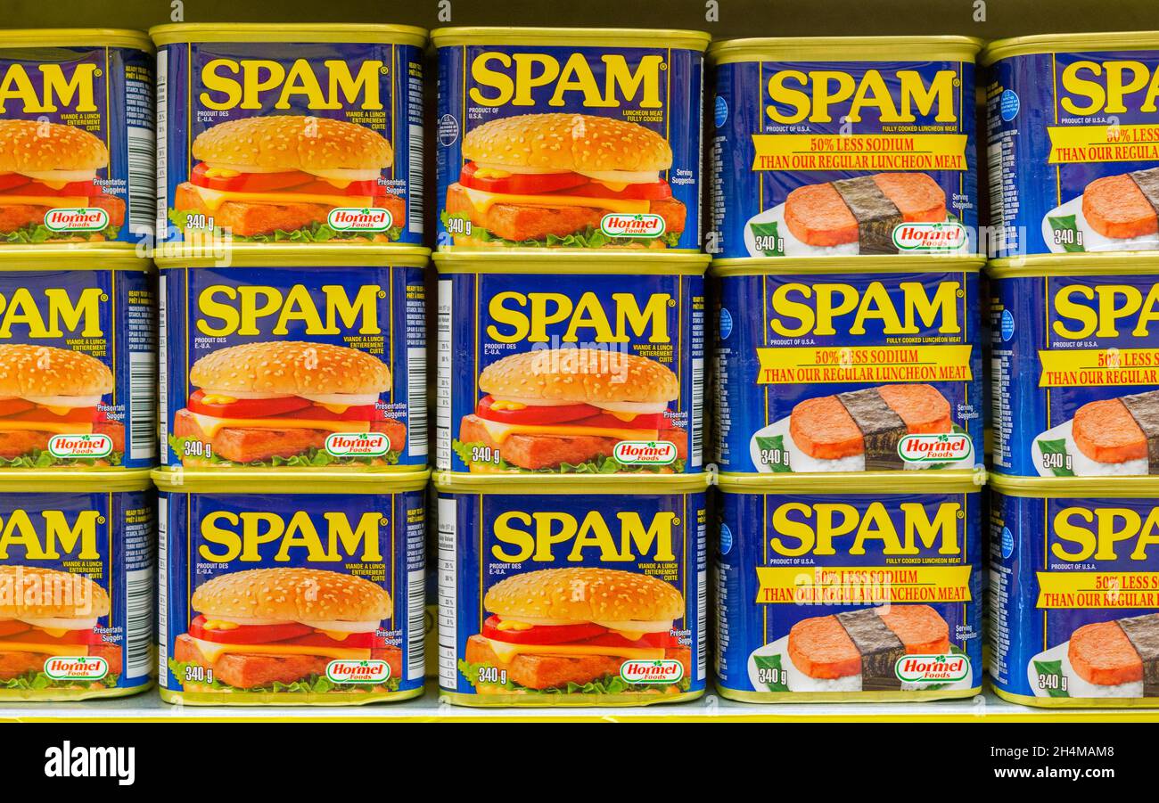 Full frame image of SPAM cans by Hormel Foods seen on a store shelf in Toronto, Canada on November 2, 2021 Stock Photo