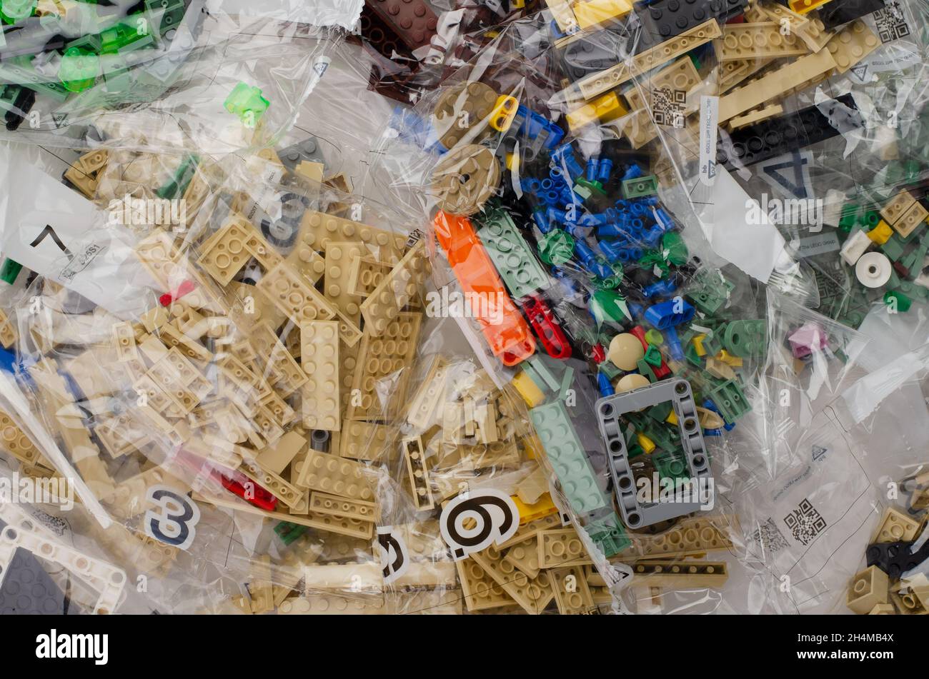 Samara, Russia - August 16, 2021: Lego pieces pile in package close up background. Stock Photo
