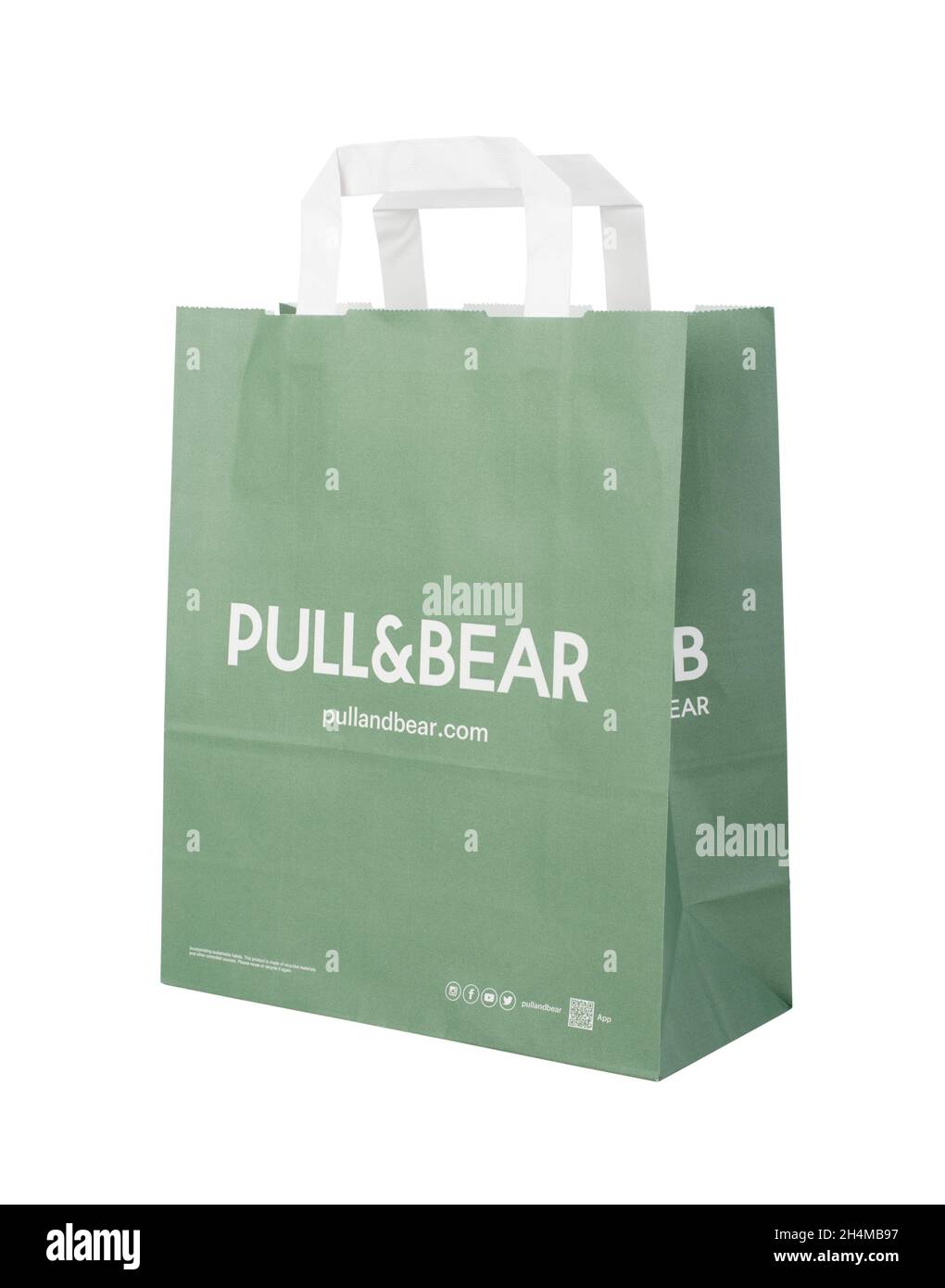 SAMARA, RUSSIA - September 13 2021: Pull & Bear green paper bag showing the logo of the spanish clothing and accessories retailer. Isolated on a white Stock Photo