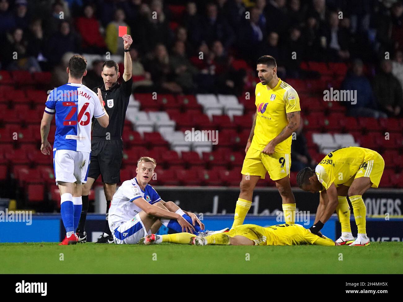 Blackburn Rovers' Jan Paul van Hecke (third right) is shown a straight red card by referee Jarred Gillett after a foul on Fulham's Harry Wilson during the Sky Bet Championship match at Ewood Park, Blackburn. Picture date: Wednesday November 3, 2021. Stock Photo