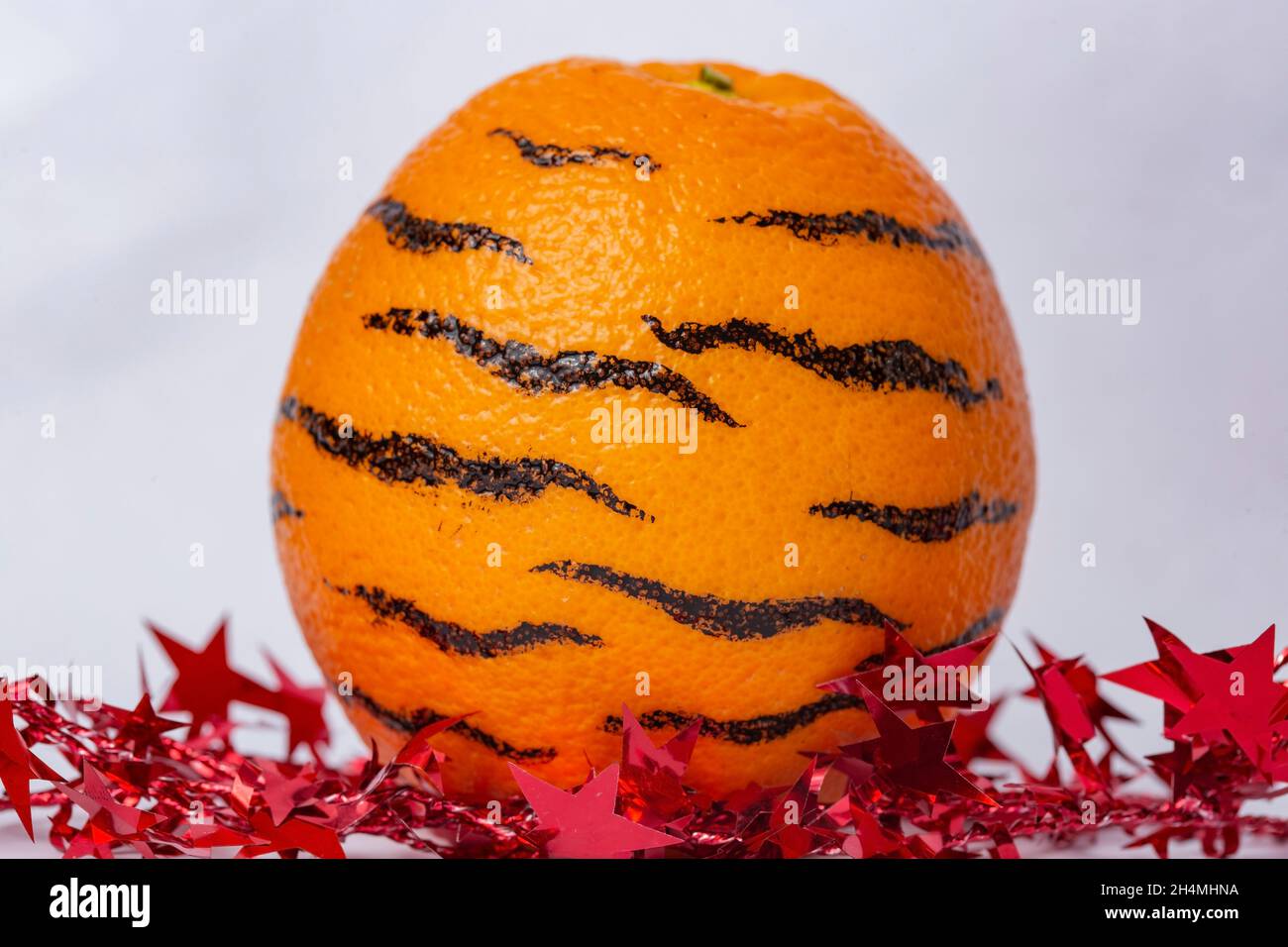 orange fruit with black stripes, happy new Chinese year 2022 Stock Photo