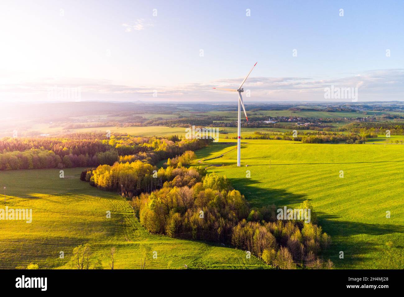 Wind turbine in green rural landscape from above Stock Photo - Alamy