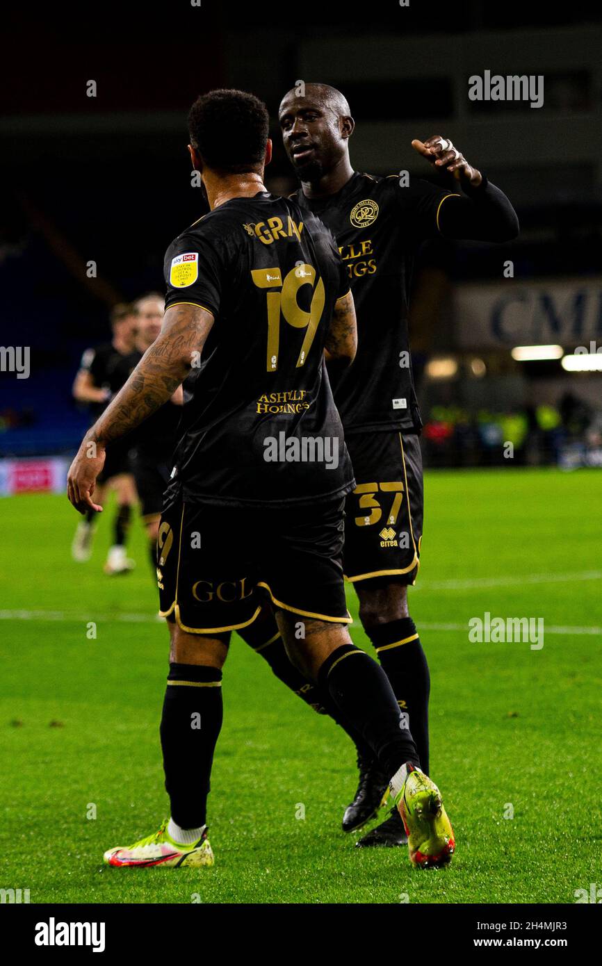 Cardiff, UK. 03rd Nov, 2021. Albert Adomah of Queens Park Rangers (R) celebrates his sides first goal scored by Andre Gay (L)) EFL Skybet championship match, Cardiff city v Queens Park Rangers at the Cardiff City Stadium in Cardiff, Wales on Wednesday 3rd November 2021. this image may only be used for Editorial purposes. Editorial use only, license required for commercial use. No use in betting, games or a single club/league/player publications. pic by Lewis Mitchell/Andrew Orchard sports photography/Alamy Live news Credit: Andrew Orchard sports photography/Alamy Live News Stock Photo