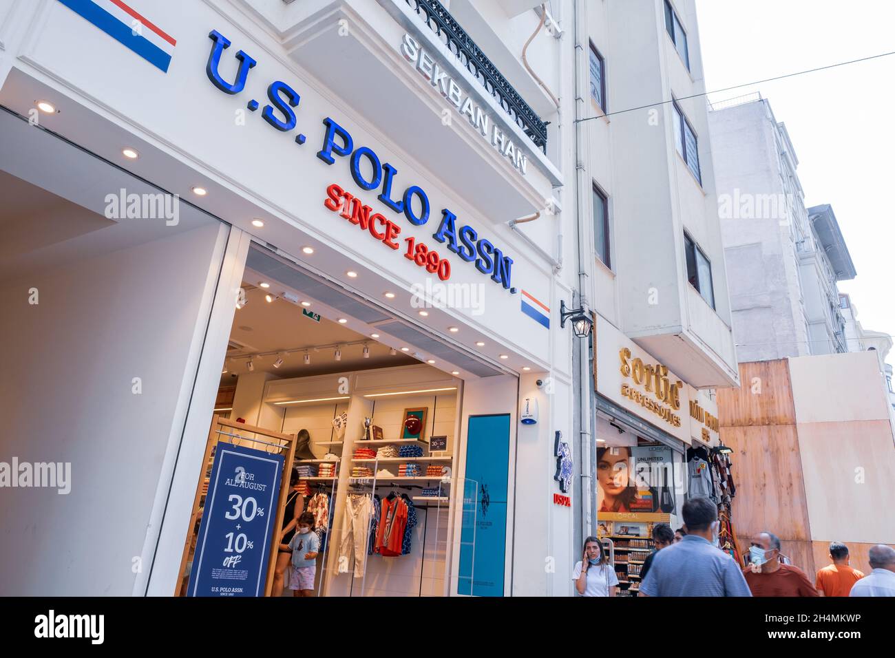 Beyoglu, Istanbul, Turkey - 08.03.2021: U.S. Polo Assn. Turkish store in  Taksim territory and some costumers buying clothes and others walking on  Isti Stock Photo - Alamy