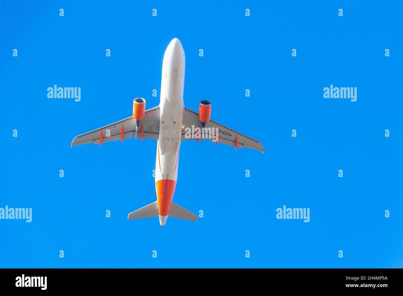 underside of EasyJet holiday flight jet aircraft taking off from Palma  Mallorca Airport against blue sky Stock Photo - Alamy