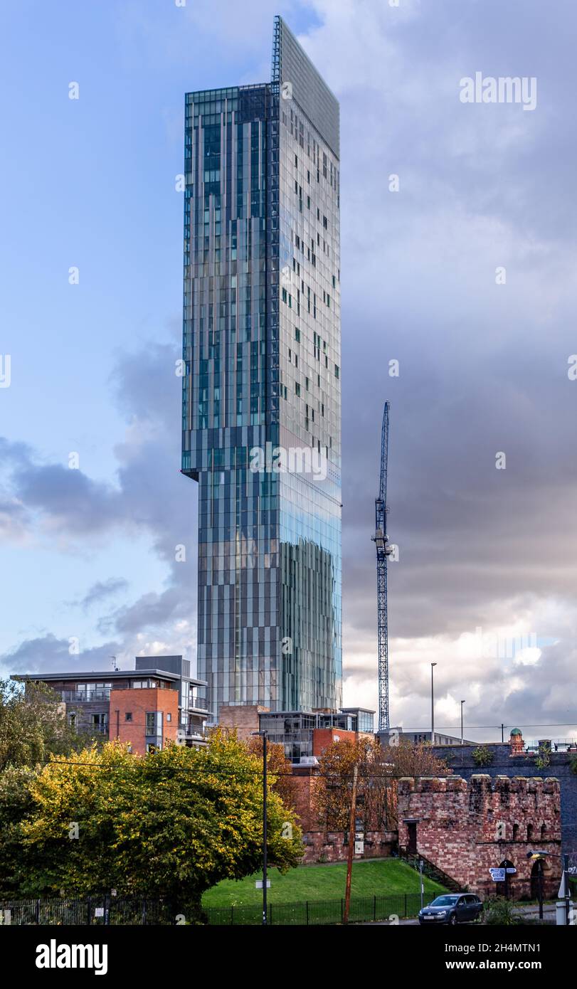 Beetham Tower seen from Castlefield with part of the reconstructed Mamucium Romand fort at the base, Manchester, England, UK Stock Photo