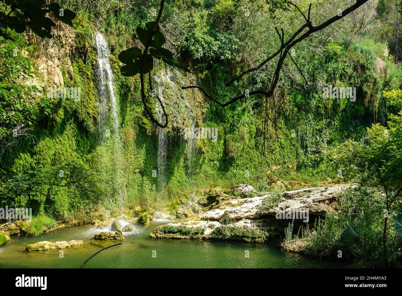 Kursunlu waterfalls in Antalya, Turkey. View in summer, with vegetation. The waterfall is on one of the tributaries of the Aksu River, where the tribu Stock Photo