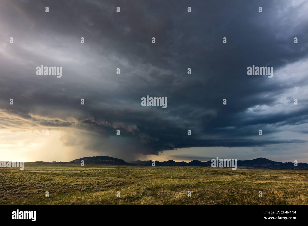 Scenic landscape with stormy sky, dramatic clouds and approaching thunderstorm near Malta, Montana Stock Photo