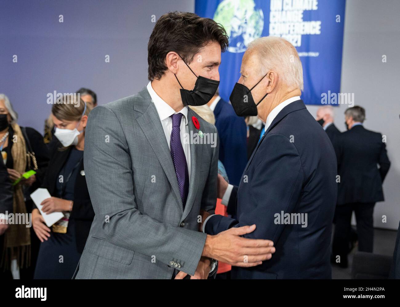 Glasgow, United Kingdom. 02nd Nov, 2021. U.S President Joe Biden chats with Canadian Prime Minister Justin Trudeau, left, during the second day of the COP26 U.N. Climate Summit at the Glasgow Science Centre November 2, 2021 in Glasgow, Scotland. Credit: Adam Schultz/White House Photo/Alamy Live News Stock Photo