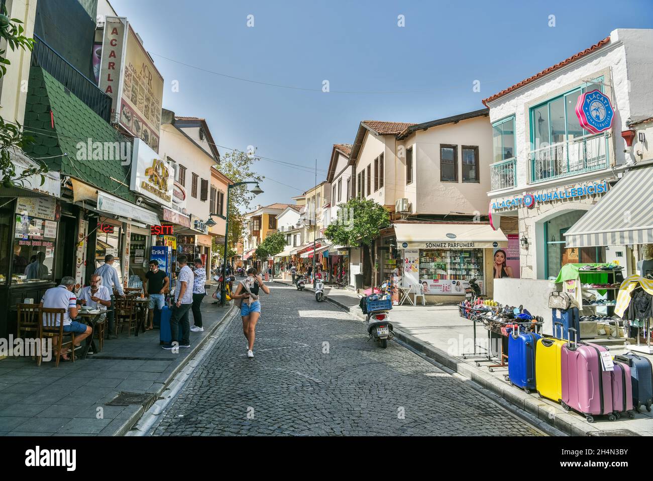 Cesme, Izmir, Turkey – October 4, 2020. View of Ataturk Bulvari street in Cesme resort town of Izmir province in Turkey. View with historic buildings, Stock Photo
