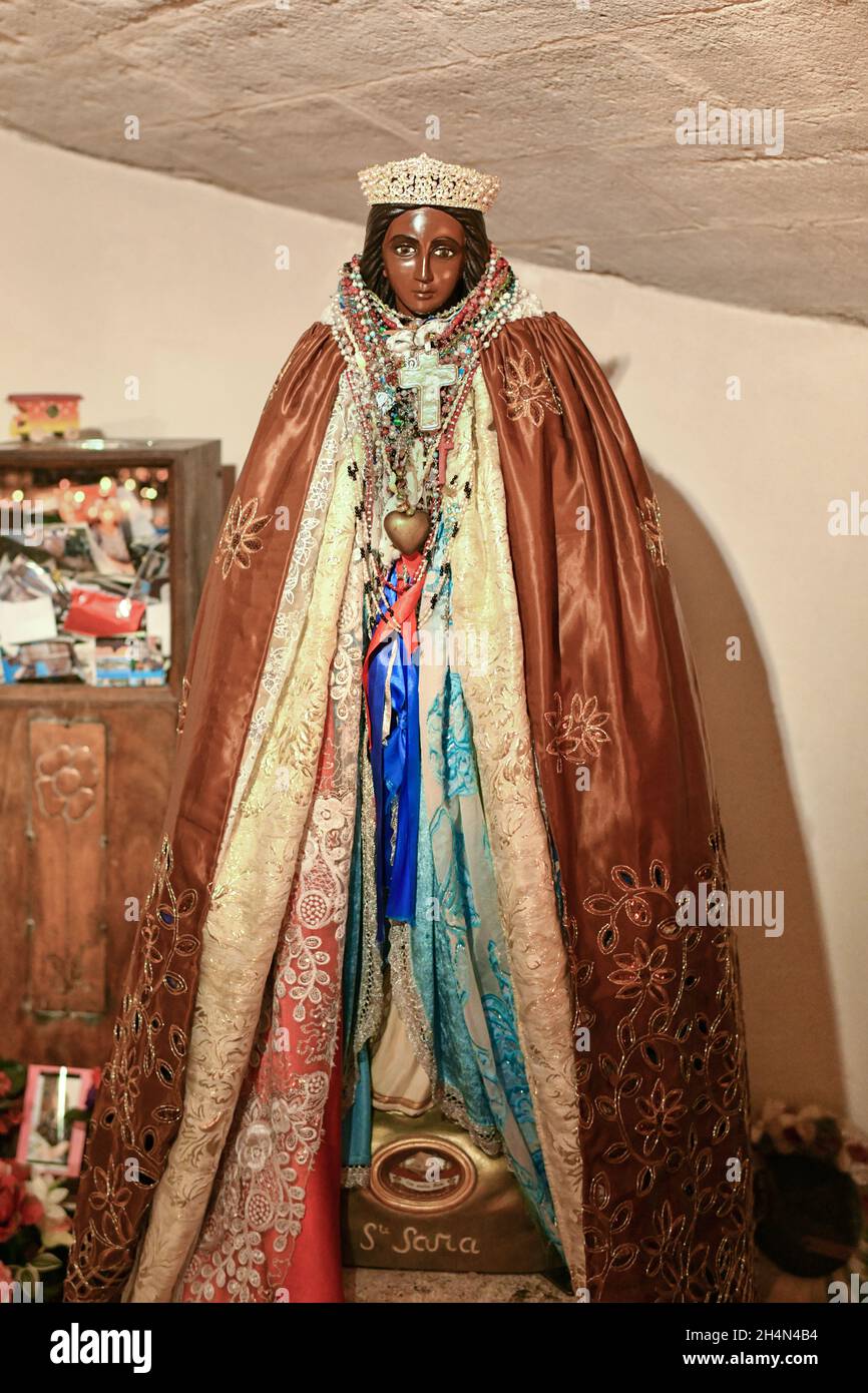 Black Saint Sarah in a church, the patroness of the gypsies Stock Photo