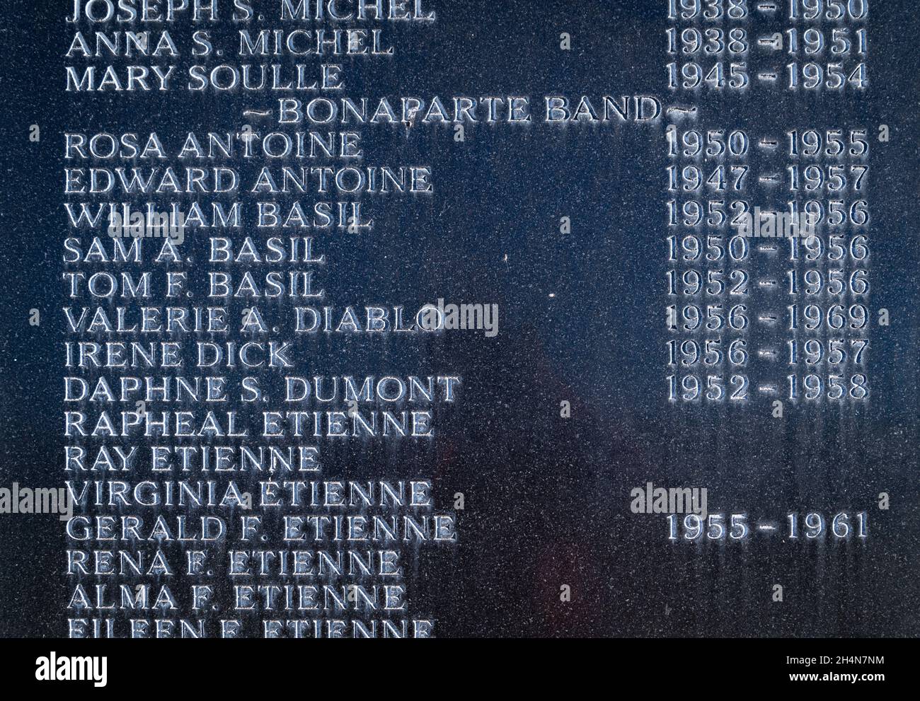 Close up of monument with names at the Indian Residential School. The remains of over 200 children are believed to be buried on site in unmarked grave Stock Photo