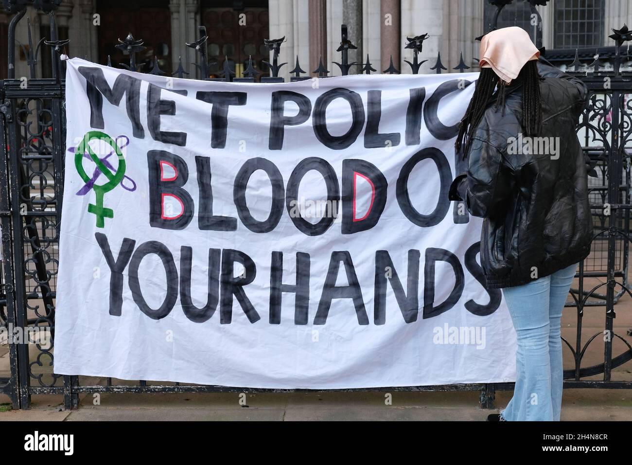 London, UK. Sisters Uncut and other organisations protest police violence against women outside the Royal Courts of Justice. Stock Photo