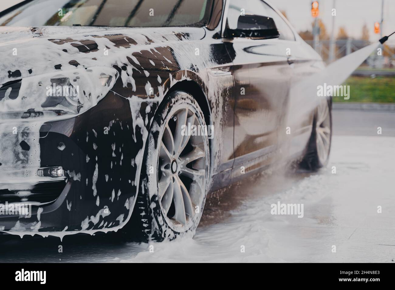 Process of professional car wash with chemical detergent and high