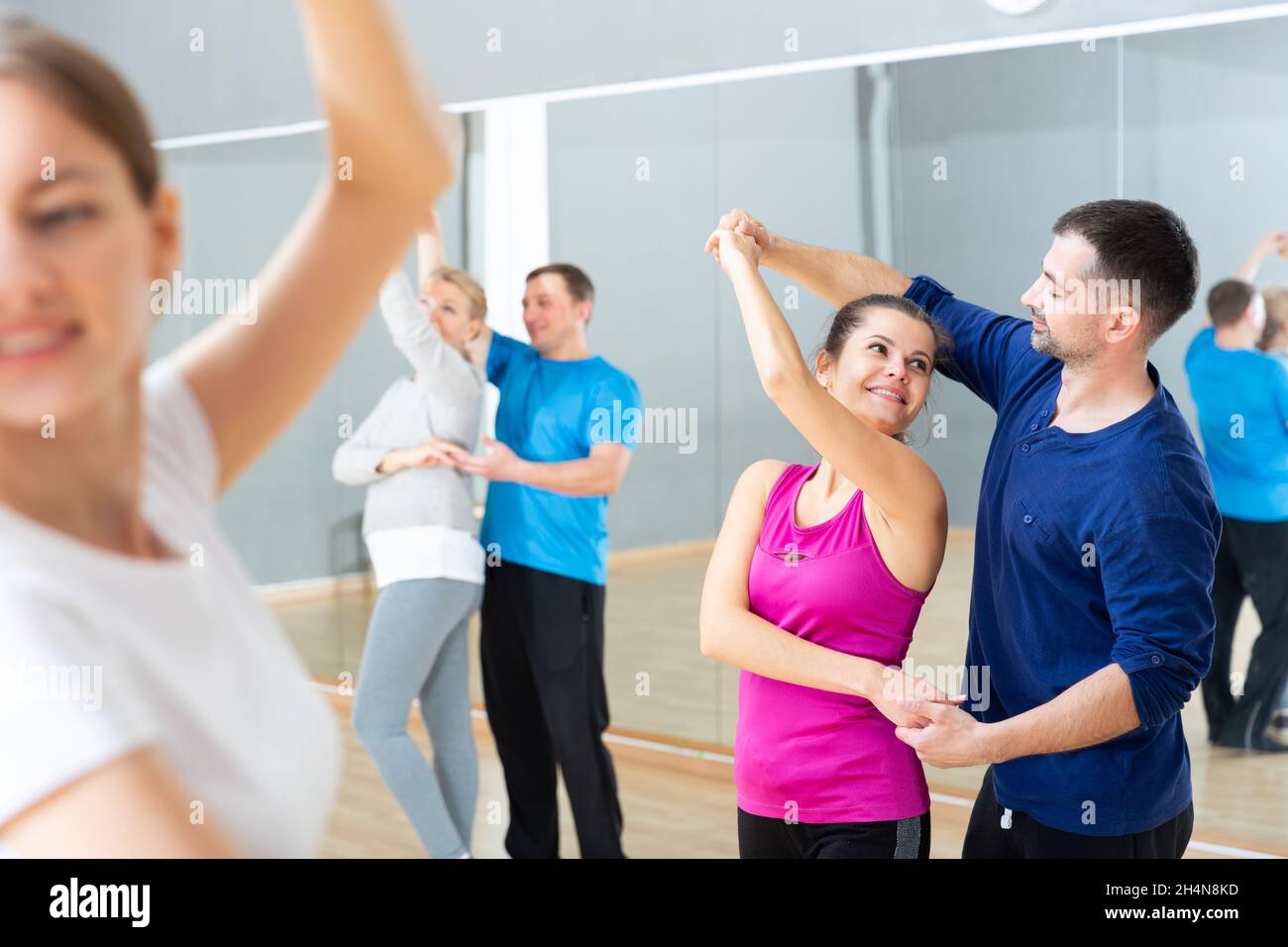 People practicing bachata movements Stock Photo