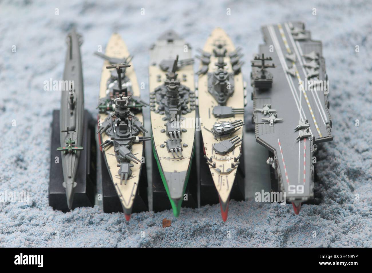 The lineup of miniature battleships consists of the enterprise carrier, the submarine, the battleship Musashi, the battleship Yamato, the main battles Stock Photo