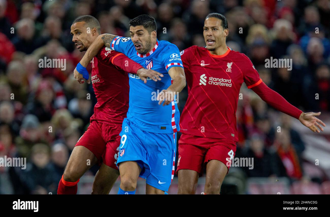 Liverpool. 3rd Nov, 2021. Atletico Madrid's Luis Suarez (C) is challenged by Liverpool's Joel Matip (L) and Virgil van Dijk during the UEFA Champions League Group B match between Liverpool and Atletico Madrid in Liverpool, Britain, on Nov. 3, 2021. Liverpool won 2-0. Credit: Xinhua/Alamy Live News Stock Photo