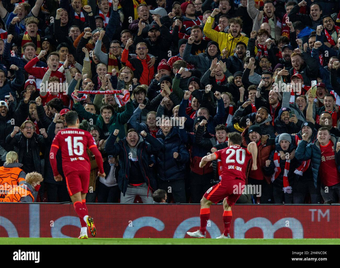 Liverpool. 3rd Nov, 2021. Liverpool's Diogo Jota (R) celebrates scoring  with fans during the UEFA Champions League Group B match between Liverpool  and Atletico Madrid in Liverpool, Britain, on Nov. 3, 2021.