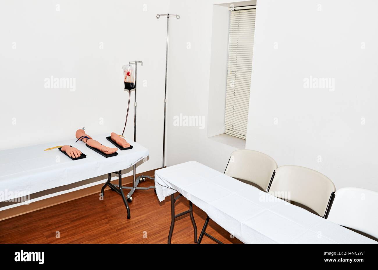 Classroom for training emergency medical technicians in blood draw techniques Stock Photo