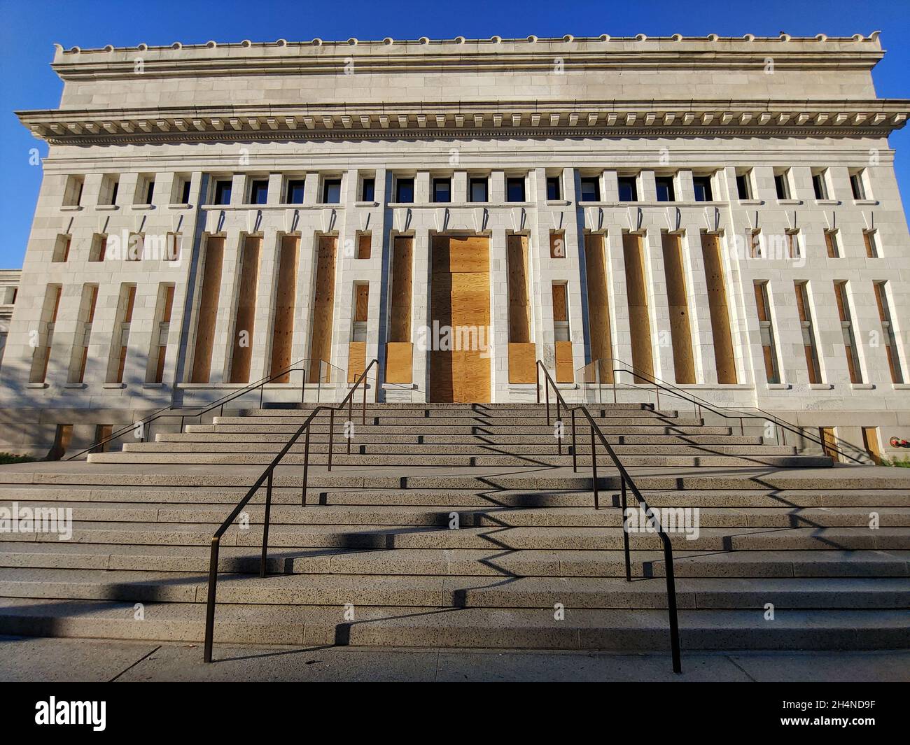 A historical building in Washington, D.C. is boarded up during the BLM ...