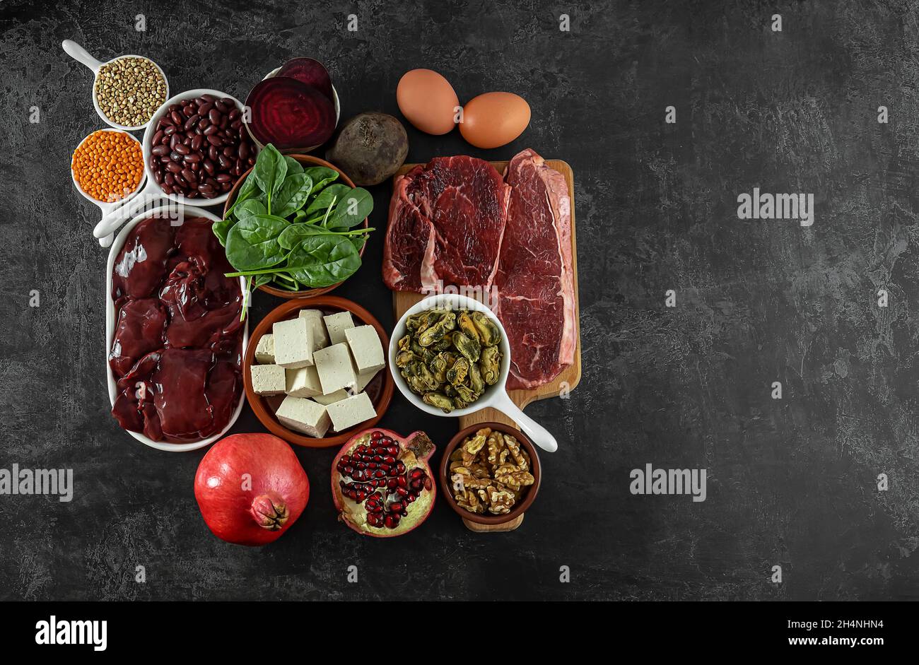 Foods high in Iron, including eggs, nuts, spinach, beans, tofu, liver