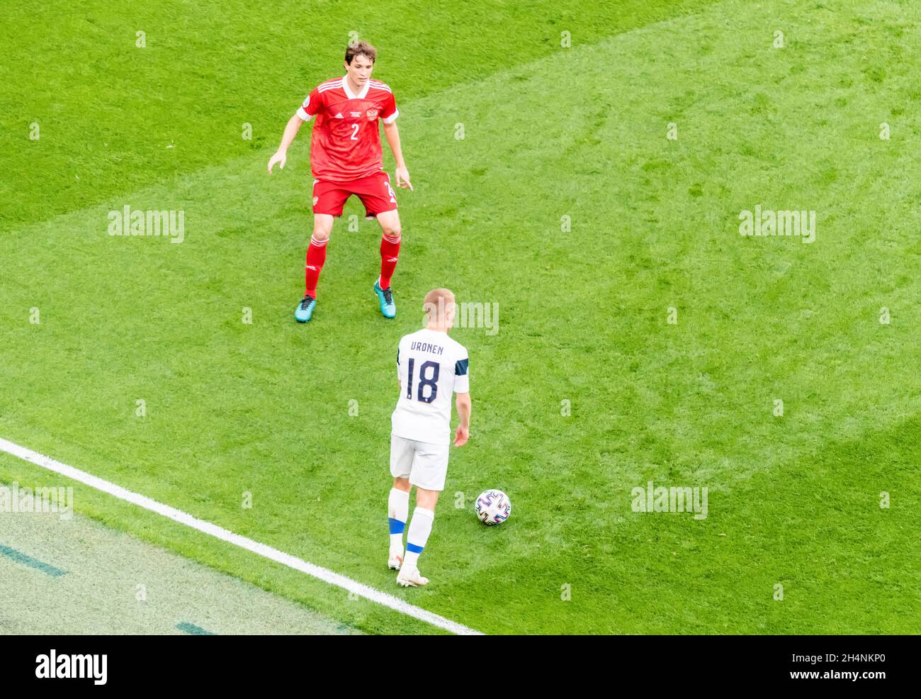 Saint Petersburg, Russia – June 16, 2021. Russia national football team defender Mario Fernandes and Finland full-back Jere Uronen during EURO 2020 ma Stock Photo
