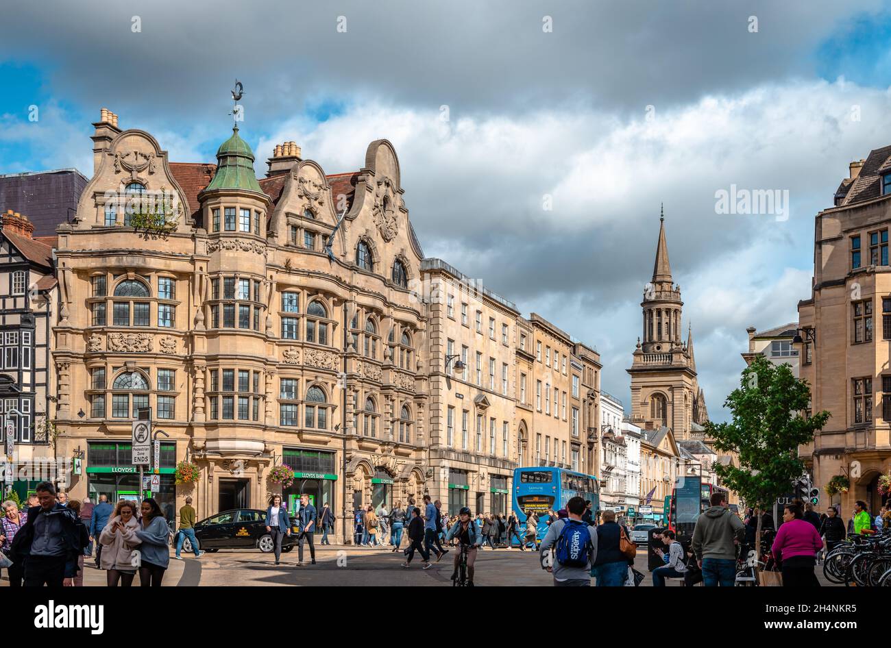 The junction of High street, Queen st, St Aldates and Cornmarket street in the inner city. The Lloyds bank building dominates the picture. Stock Photo