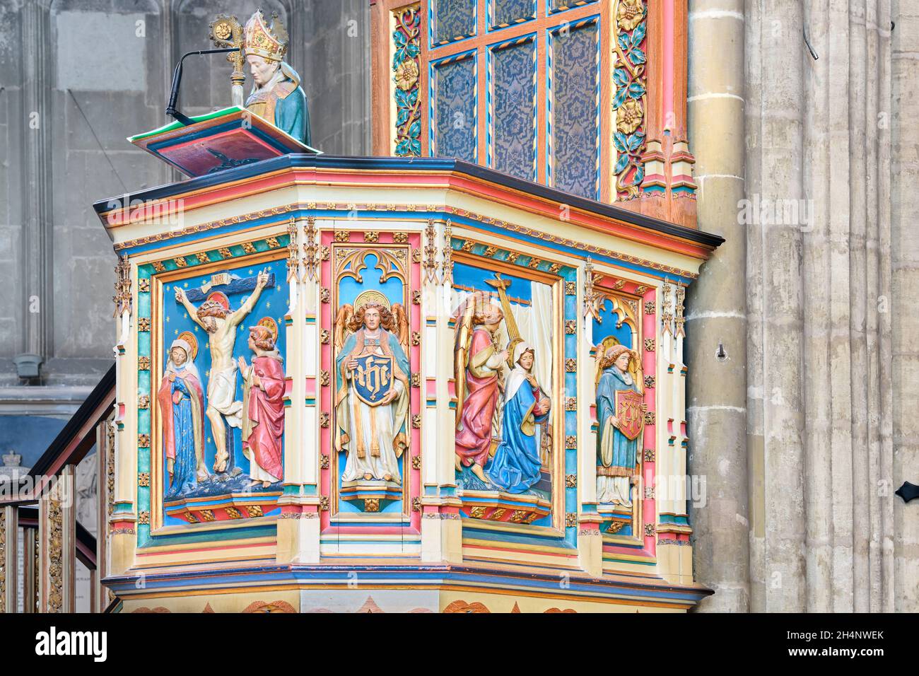 Ornate late 19th century painted pulpit in the cathedral at Canterbury, England. Stock Photo