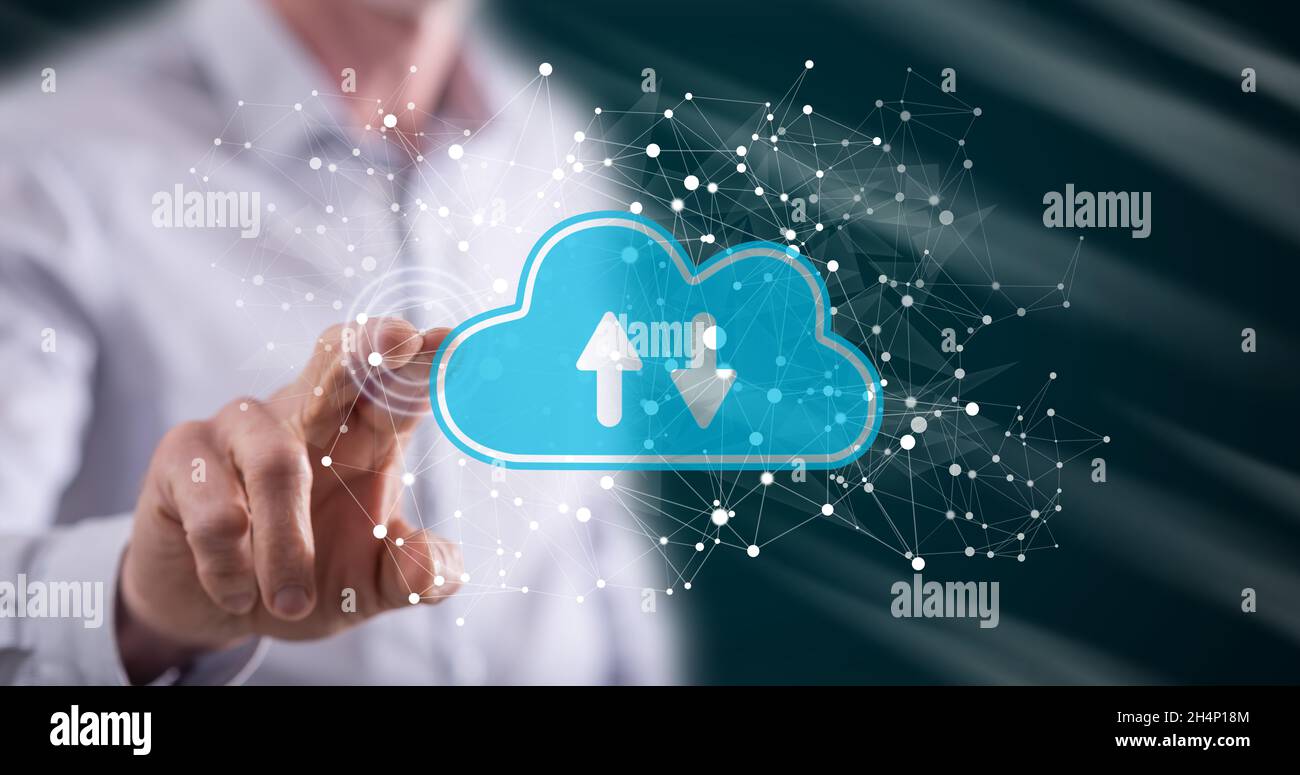 Man touching a cloud storage concept on a touch screen with his finger ...