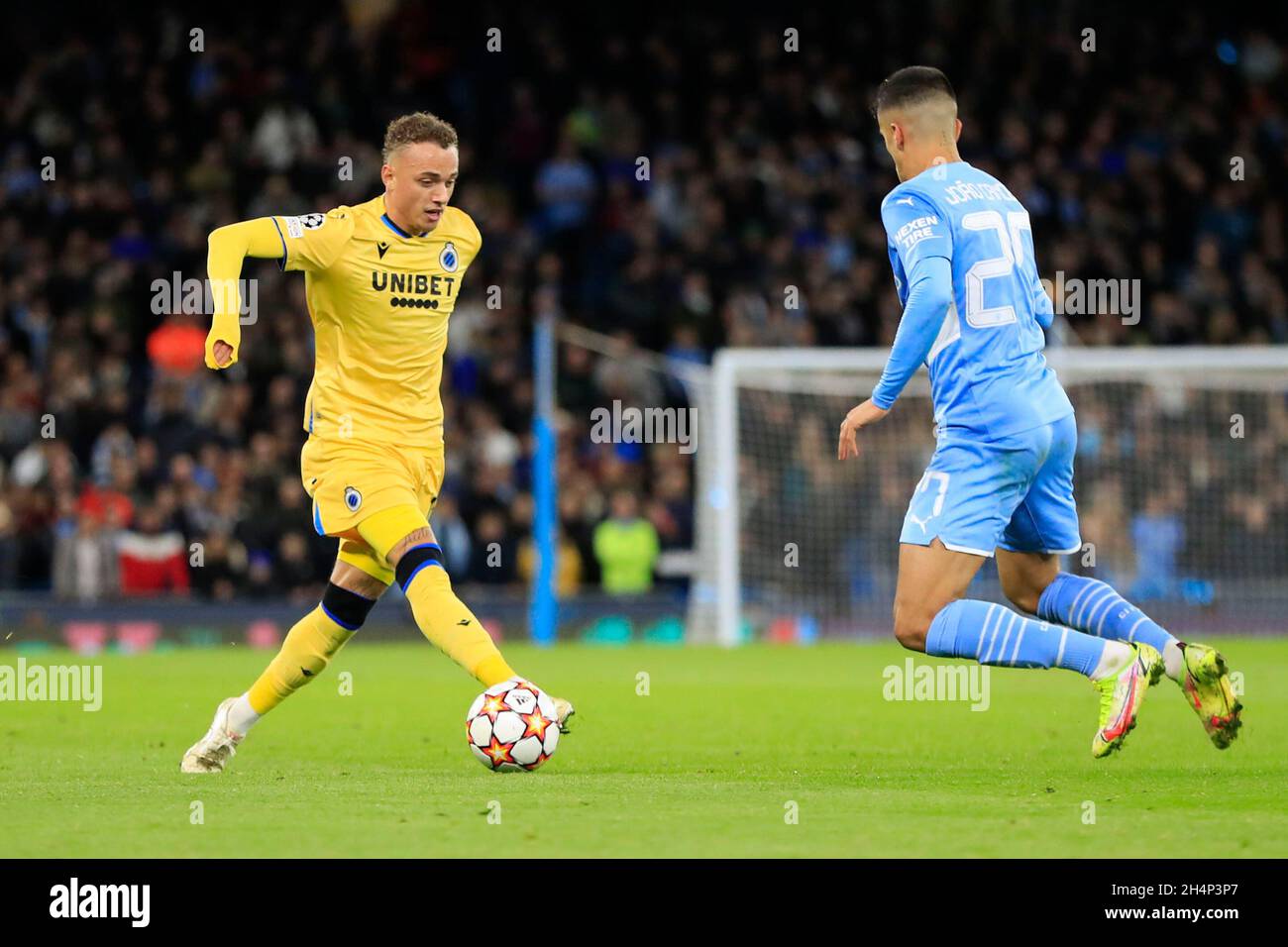 Manchester, UK. 03rd Nov, 2021. Noa Lang #10 of Club Brugge is confronted  by Joao Cancelo #27 of Manchester City in Manchester, United Kingdom on  11/3/2021. (Photo by Conor Molloy/News Images/Sipa USA)