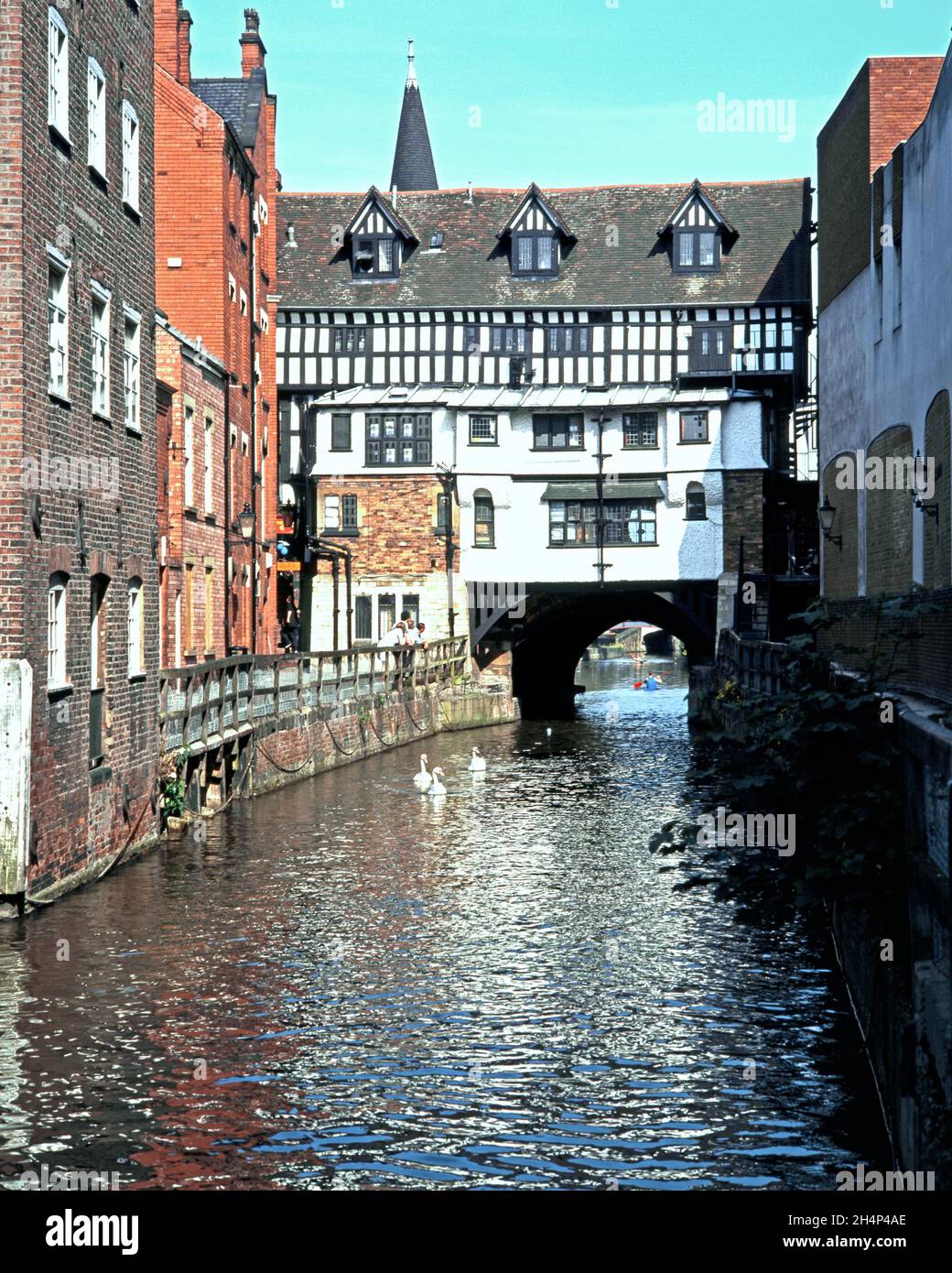 View of the High Street shops passing over the and River Witham, Lincoln. Stock Photo