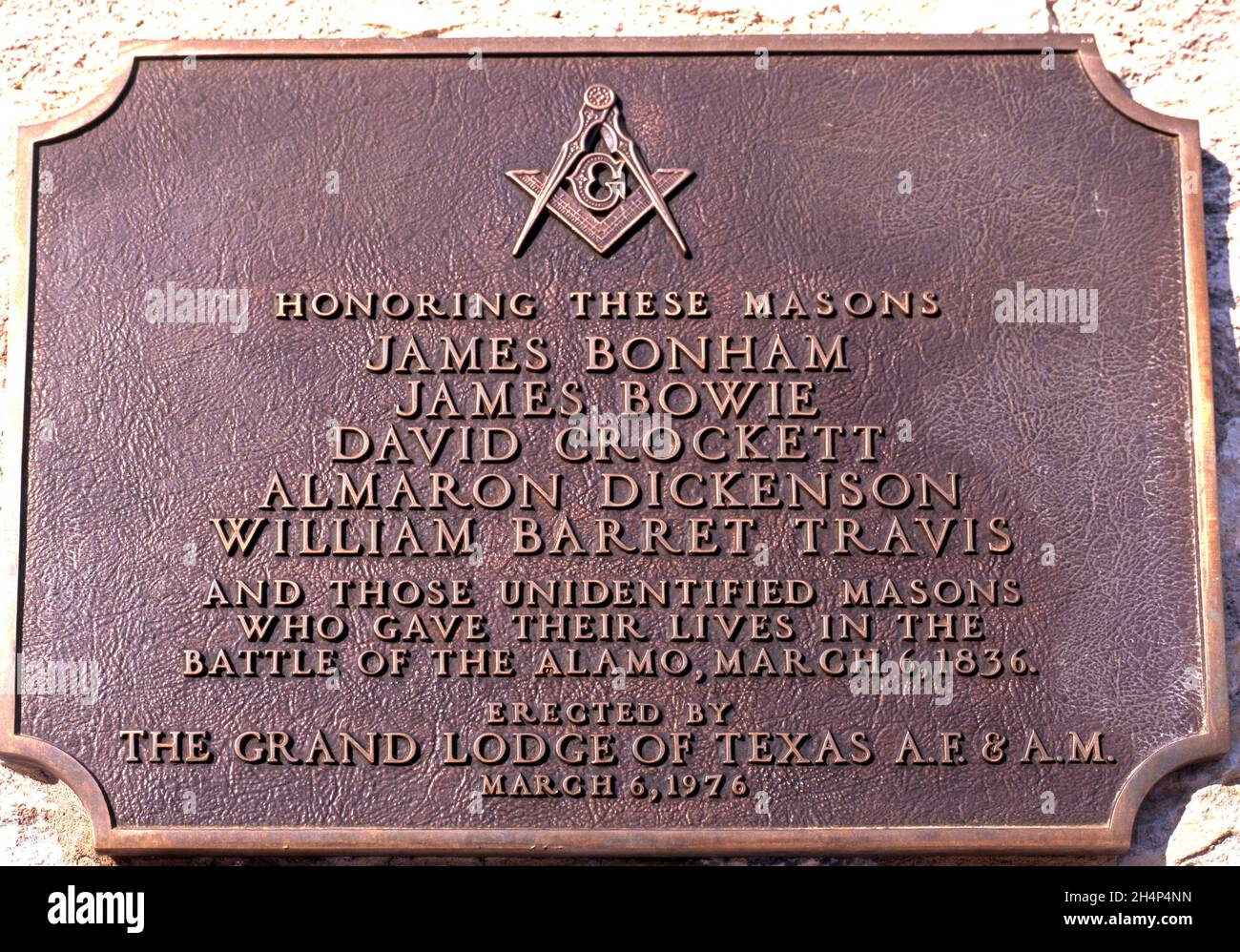 Plaque honouring Masons on The Alamo wall, San Antonio, Texas, USA. Stock Photo