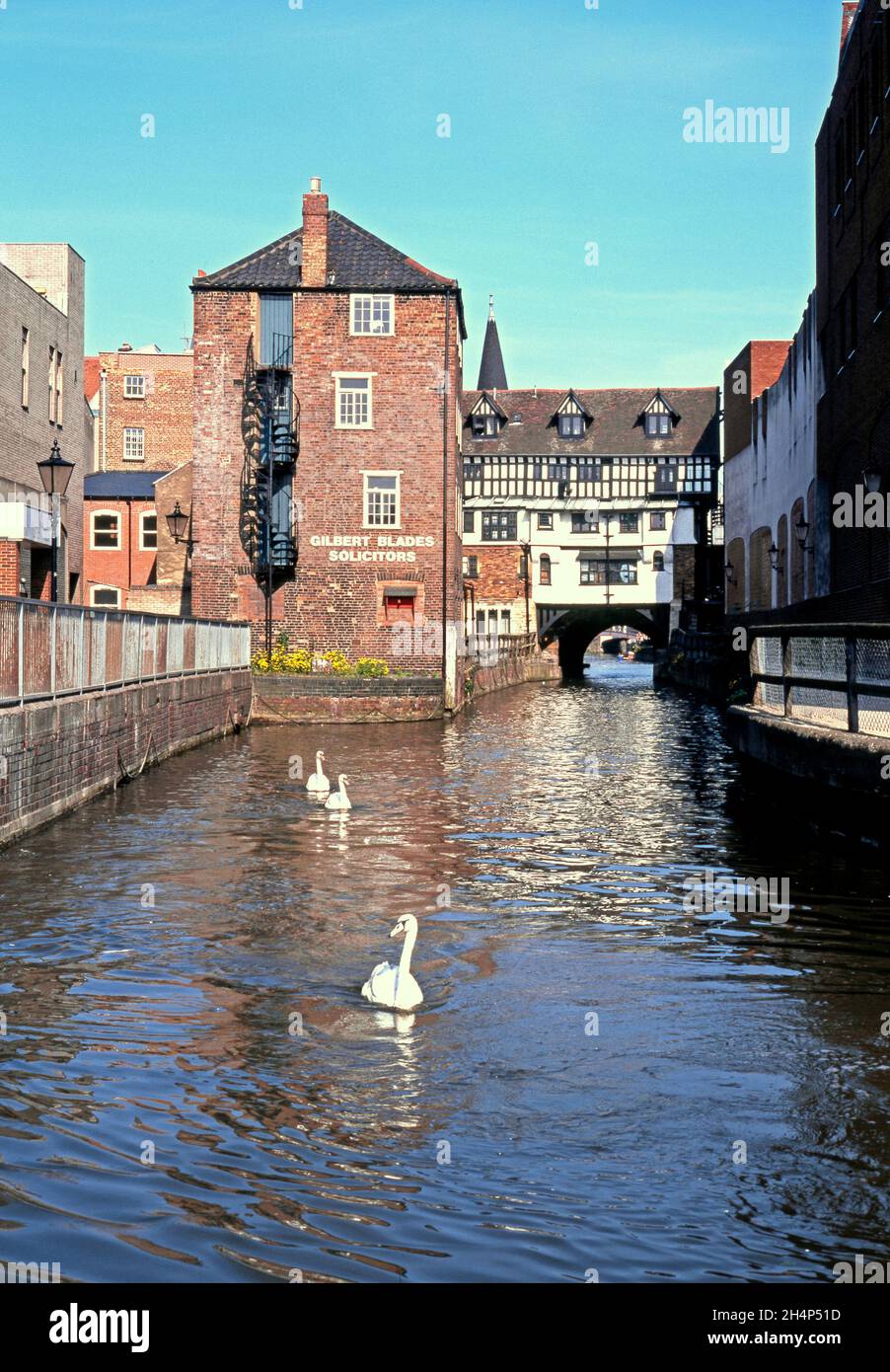 View of the High Street shops passing over the and River Witham, Lincoln, UK. Stock Photo