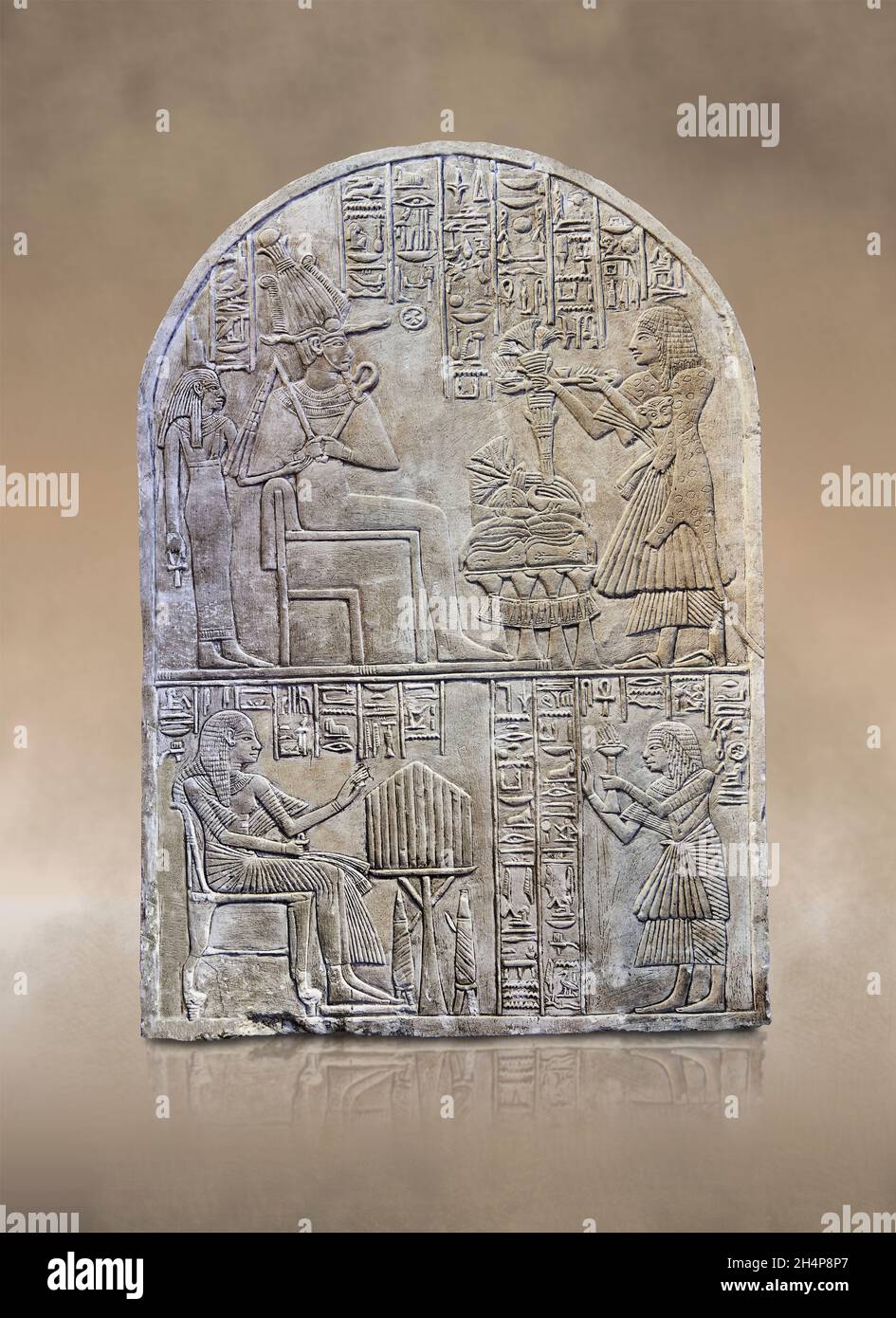 Ancient Egyptian stele of priest Iouny, 1069-665 BC, 3rd Intermediate period, limestone . The Louvre Museum inv C89. In the top register Iouny makes a Stock Photo