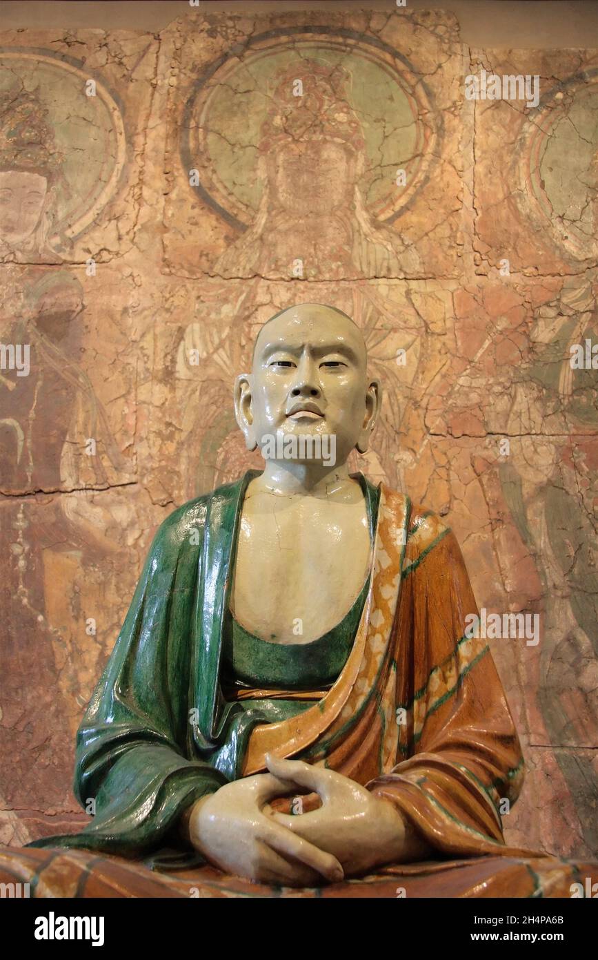 The Eighteen Arhats (or Luohan) of Chinese Buddhism are conceived as the original followers of Gautama Buddha who have followed the Noble Eightfold Pa Stock Photo
