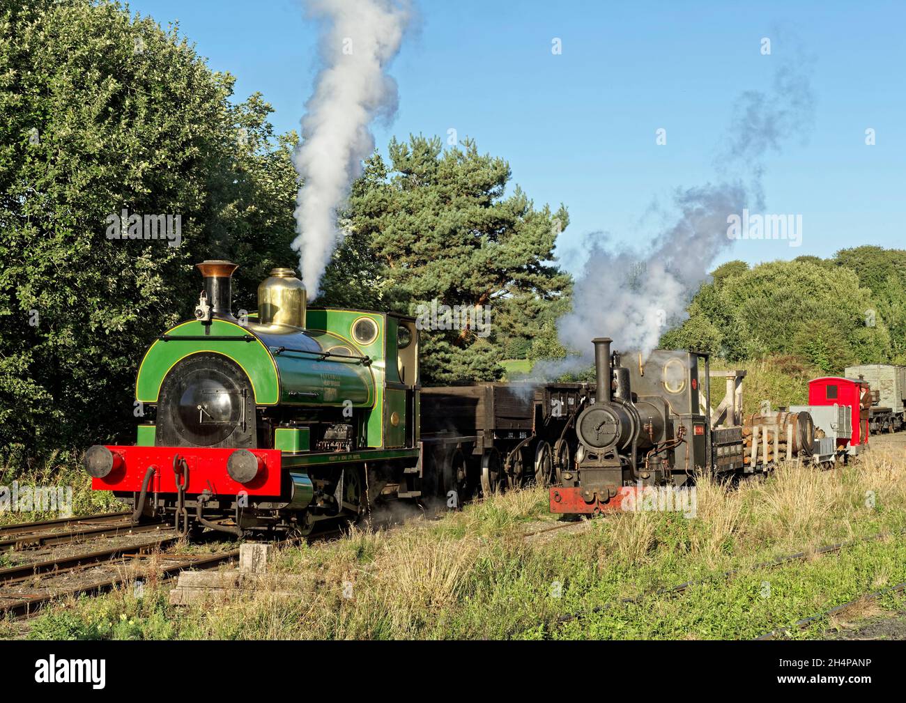 Beamish Museum colliery railway with typical working scenes being recreated for a charter event - Peckett loco with chaldron wagons. Stock Photo