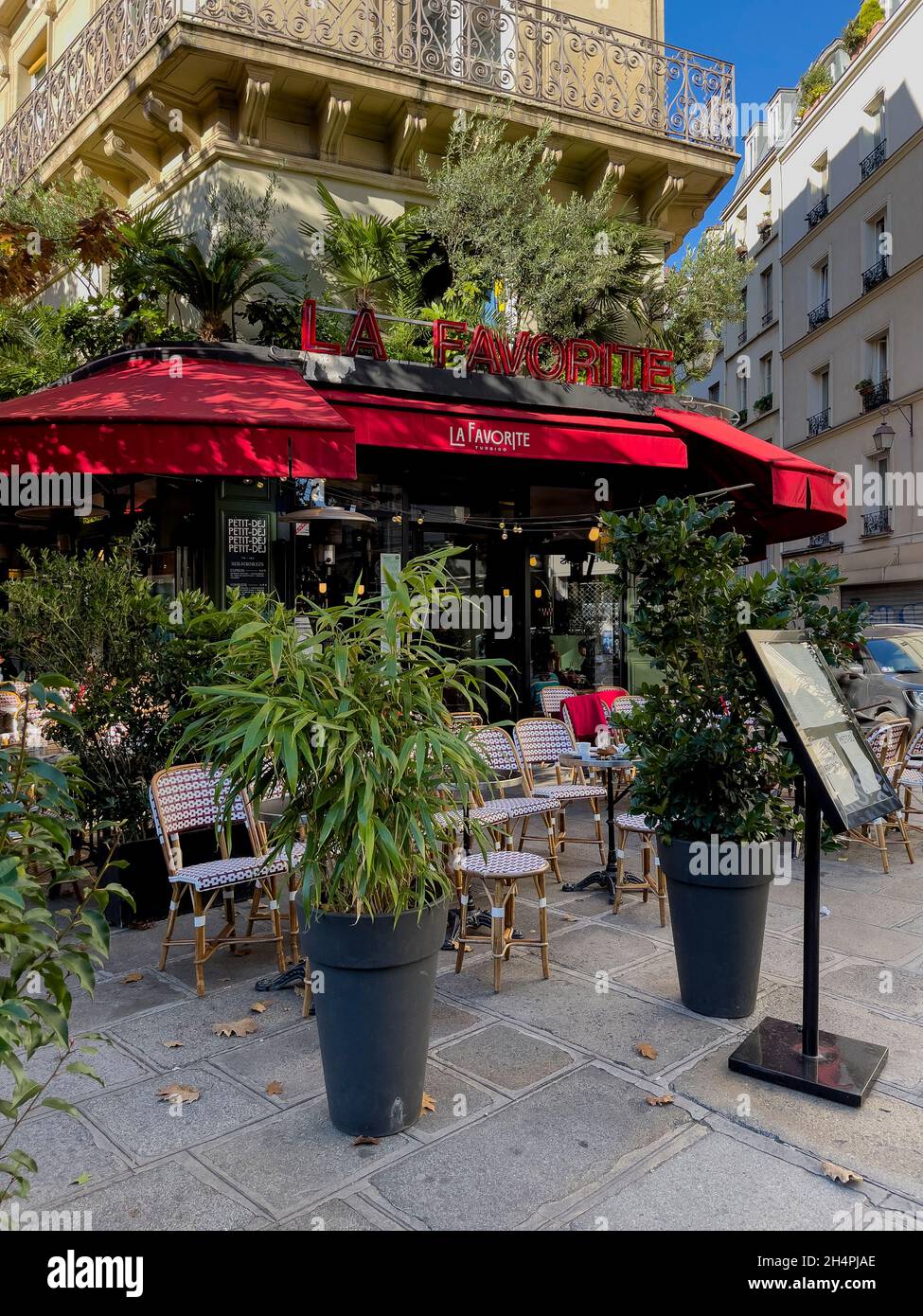 Chairs and table in a traditional Parisian sidewalk cafe, Paris