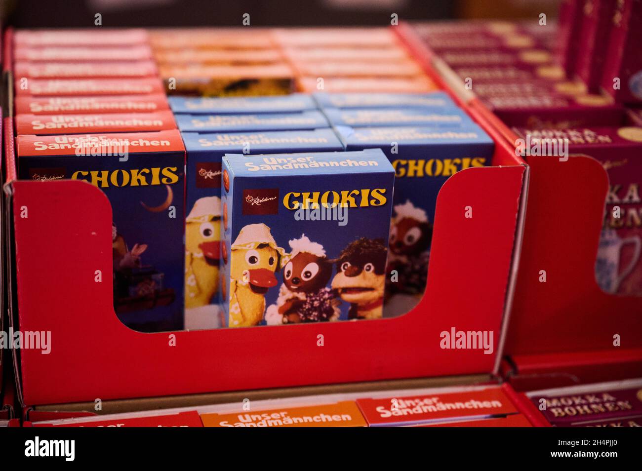 29 October 2021, Berlin: Chocolate sticks hokis of the company Rotstern with motives of Sandm nchen, Pittiplatsch and friends are for sale at the fair Ostpro 2021. Photo: Annette Riedl/dpa-Zentralbild/dpa Stock Photo